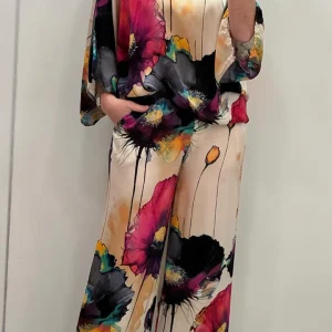 Stijlvolle en veelzijdige damesoutfitset- Artistieke bloemenprint - Losse pasvorm - Levendige kleuren